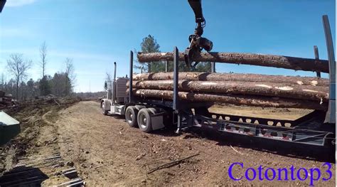 John Deere D Track Loader Loading Logs