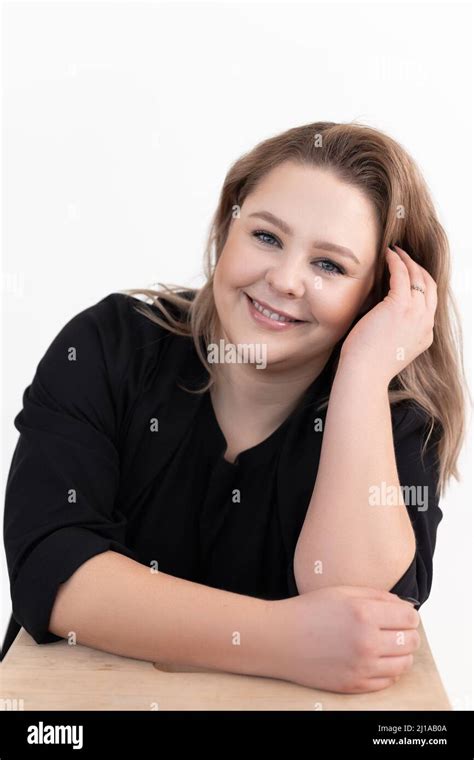 Portrait Of Happy Pretty Middle Aged Fat Woman With Long Dark Hair And