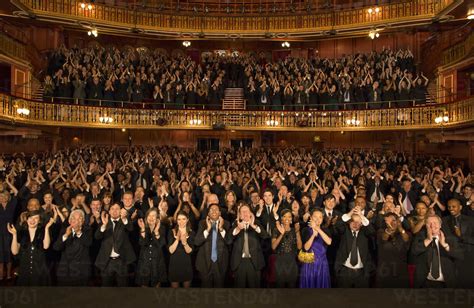 Audience Applauding In Theater Stockphoto