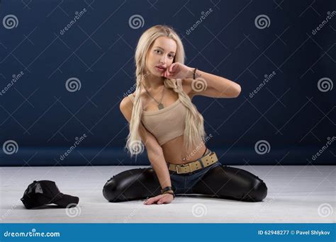 Attractive Blond Woman Sitting On Her Knees Stock Image Image Of Fashionable Music