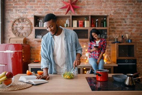 Black American Love Couple Cooking On The Kitchen Couple Cooking Black American Kitchen Stocked