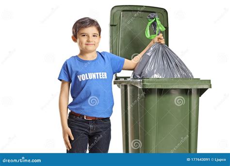 Child Volunteer Throwing A Waste Bag Into A Bin Stock Image Image Of