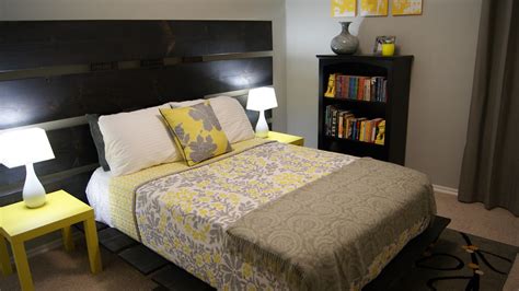 Happy mother and her children lying on a bed. Yellow and Gray Bedroom Decor - Neutral Meets Cheerful ...