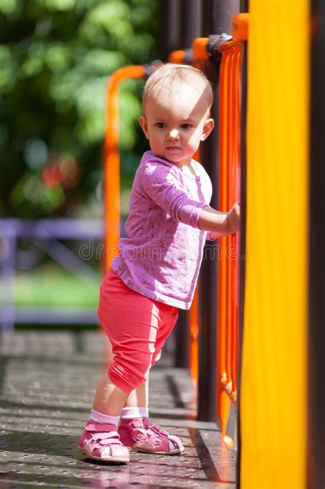 Boy On Playground Equipment Stock Photo Image Of Stand Slide 37125236