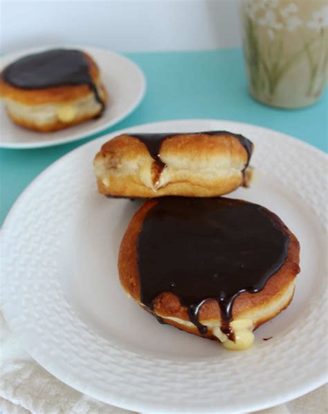 Hold a baked and cooled cupcake in one hand and insert a small paring knife, at an angle. Boston Cream Donuts Recipe - Fun Happy Home