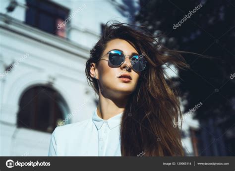 Young Girl Wearing Sunglasses Stock Photo By ©sergeycauselove 139965114