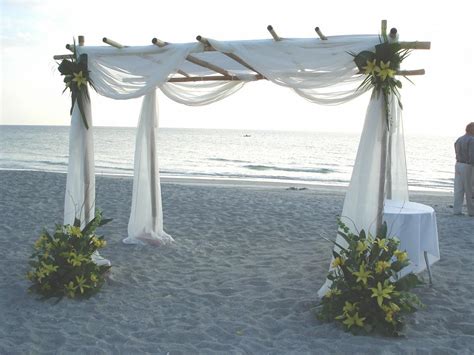 The canopy is 140 meters long and acts as a kind of giant parasol during the day, while lighting up as an illuminated object at night. bamboo canopy w yellow arr at hilton lbk beach from ...