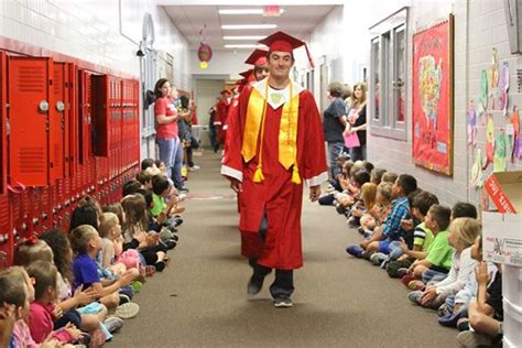 High School Grads Walk The Halls To Inspire Younger Students Be More
