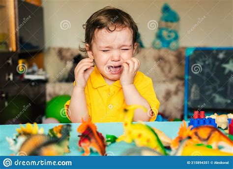 Sad Baby Boy Crying Next To Toys Stock Image Image Of Color