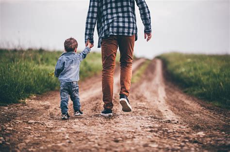 Father And Son Holding Hands Stock Photo And More Pictures Of Adult Istock