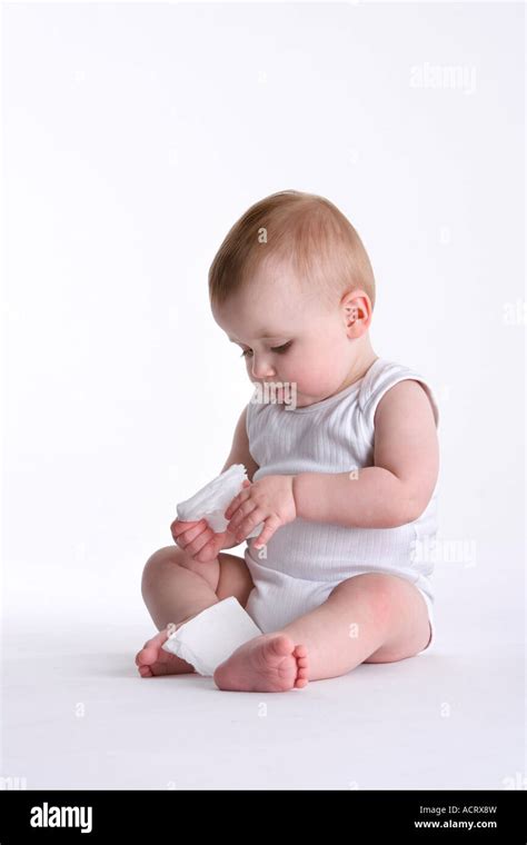 Baby Boy Playing With Paper Towels Stock Photo Alamy