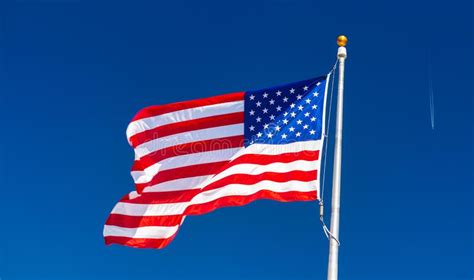 American Flag Pole Flying Low Stock Photos Free And Royalty Free Stock