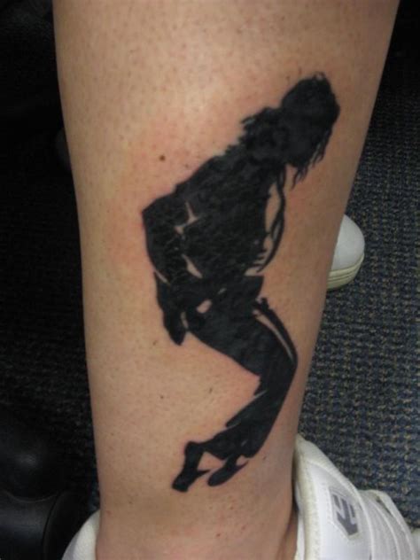 Rogers noted in his autopsy report that jackson's lips were tattooed. Dancing Michael Jackson on arm tattoo