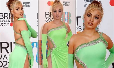 Mabel Puts On Braless Display In Striking Green Gown At Brit Awards