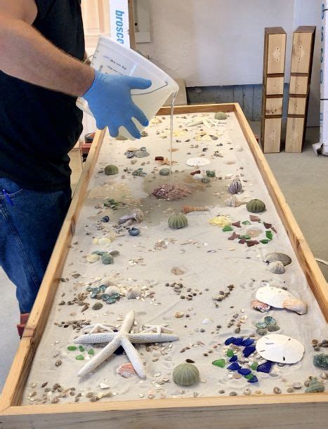 To apply this thin layer, you should use a foam brush instead of a paint brush. DYS epoxy countertop with shells | Diy resin crafts, Epoxy ...