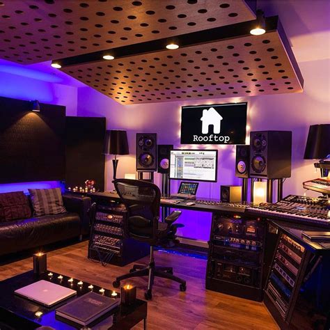 A Recording Studio With Lots Of Equipment And Lights