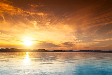 Top 60 Sunrise Over Water Stock Photos Pictures And Images Istock