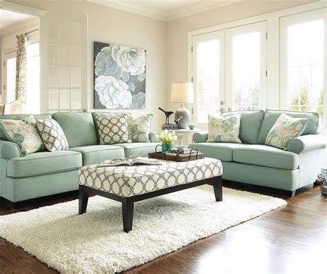 Color isn't really seafoam from the ninties. Signature Design By Ashley Daystar Seafoam Pattern Ottoman ...