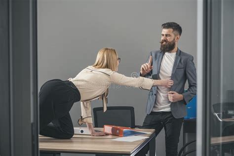 Businesswoman Seducing Male Employee Flirting At Workplace In Modern