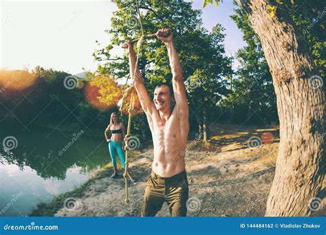 Friends Have Fun On The Lake Stock Photo Image Of Person Swinging
