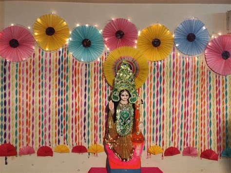 Saraswati Puja Decorations With Paper Flowers And Umbrellas