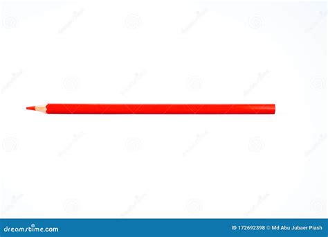 A Sharpened Red Colored Pencil Crayon Is Isolated On A White Background