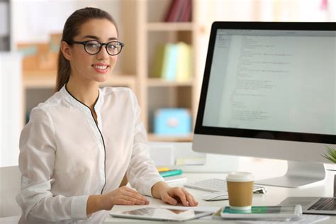 Smiling Female Programmer Working In The Office Stock Photo 01 Free