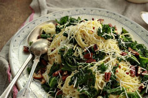 Garlic spaghetti spaghetti dinner spaghetti recipes spaghetti kitchen spaghetti squash pasta spaghetti cooking spaghetti spaghetti vegetables creamy this angel hair pasta recipe is tender noodles coated in garlic, fresh herbs, olive oil, butter and parmesan cheese and topped with tomatoes. Angel Hair with Lemon, Kale, and Pecans recipe ...