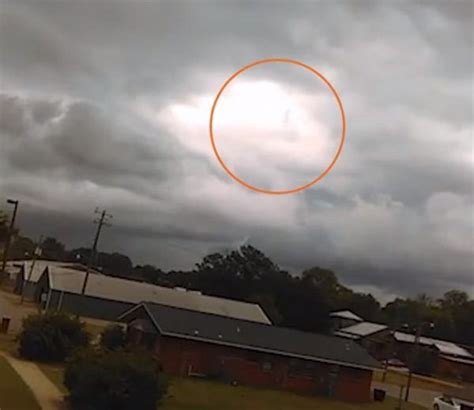powerful footage shows god like figure walking through the clouds
