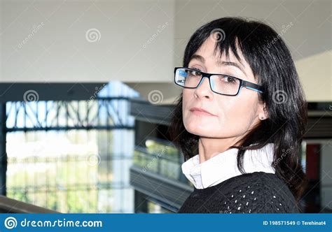 Young Business Woman 45 Yo With Short Hair Wearing Glasses Looking