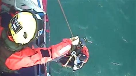 Watch Coast Guard Rescue Lost Surfer Who Clung To Board For More Than