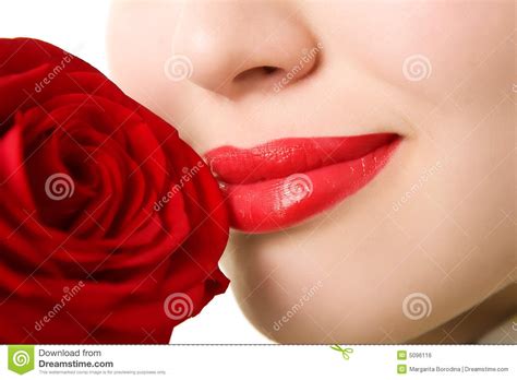 Close Up Of Beautiful Girl With Red Rose Royalty Free