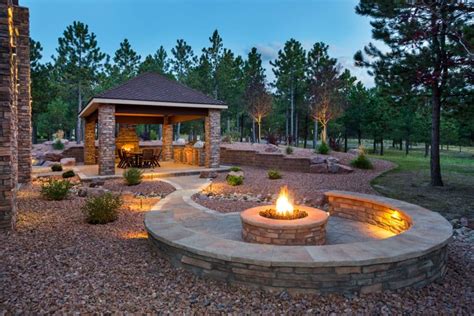 Fire glass is a breathtaking option for an outdoor fire pit design. 21 Great Outside Fire Pits Ideas For Your Backyard in 2021