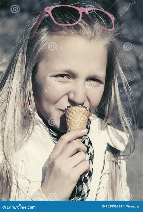 Happy Teen Girl Eating An Ice Cream Outdoor Stock Photo Image Of Jacket Fashion