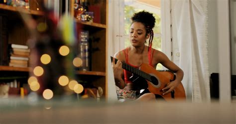 Black Woman Singing And Playing Guitar At Home Stock Video Footage Storyblocks