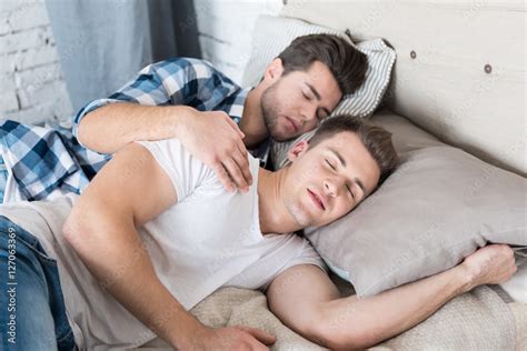 Cute Gay Couple Sleeping Together In Bed Stock Photo Adobe Stock