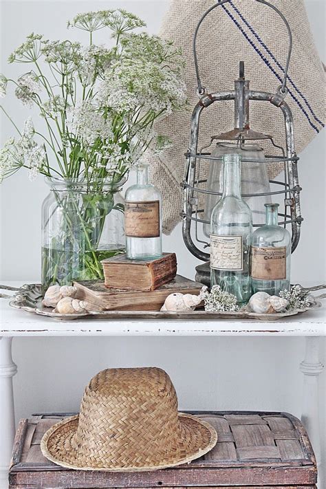 Rustic Display Using Natural Elements And Distressedold Man Made Items