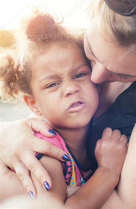 Mother Comforting Her Crying Little Girl Stock Photo By ©guruxox 115754514