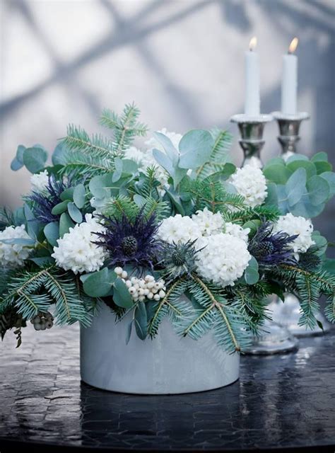 White Hyacinths Yews Eucalyptus Snowberries And Globe Thistle Chic