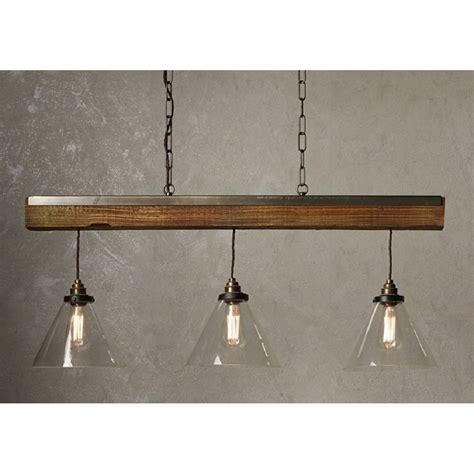 Knowing how to use decorative ceiling beams properly can make for a wonderful interior design. ASPEN multiple pendant fitting with 3 lights hanging on ...