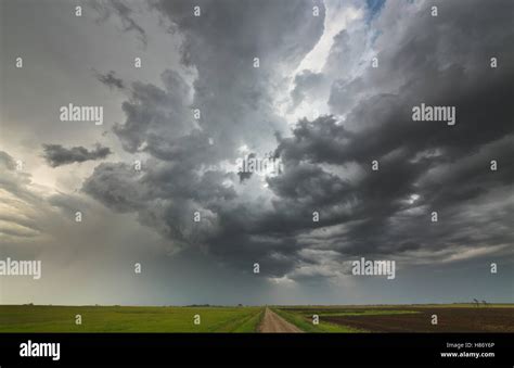 Storm Clouds At Sunset Billowing Over Prairie North Dakota Stock Photo