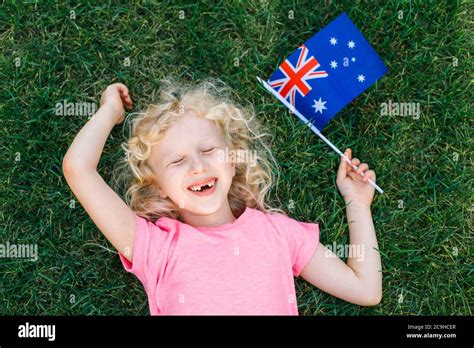 Adorable Cute Happy Caucasian Girl Holding Australian Flag Smiling