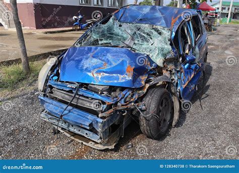 Blue Car Wreck That Has Suffered Major Damage Parking Is A Mate