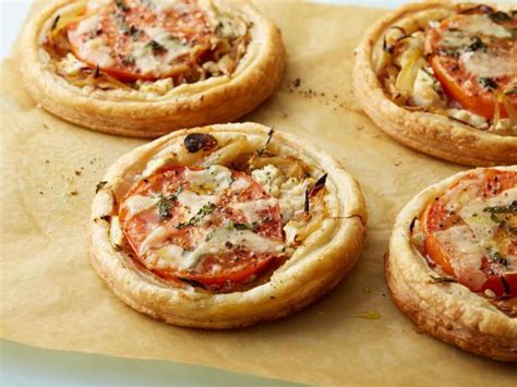 Dot the top with the goat cheese, the pinch of thyme and a nice grind or two of black pepper. Tomato and Goat Cheese Tarts Recipe | Ina Garten | Food Network