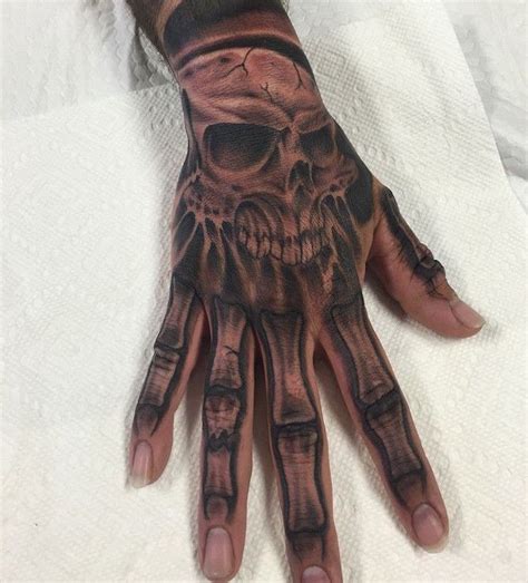 Pin En Skull Back Of Hand Tattoos