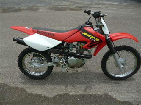 This engine's compression ratio is 9.7:1. 2002 Honda XR80R - Moto.ZombDrive.COM