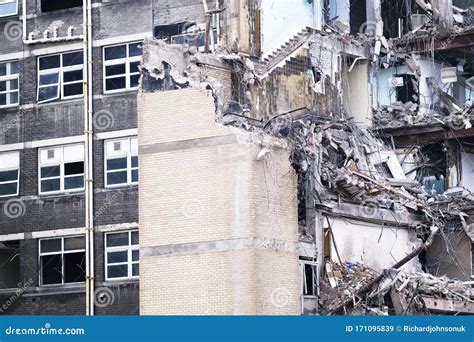 Demolition Of Office Building Collapse Following Explosion By Construction Industry Stock Image