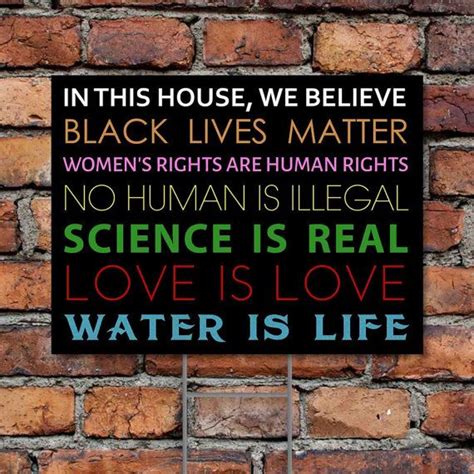 In This House We Believe Yard Sign By Chuckcharliedesigns