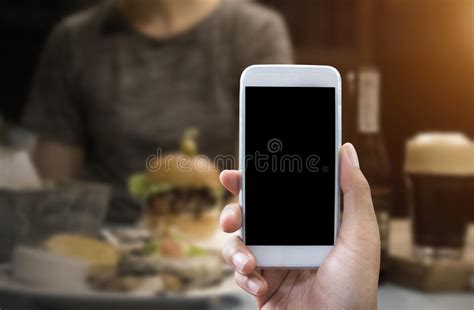 Mans Hand Shows White Smartphone Vertical Position Stock Photos Free
