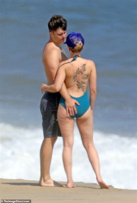 Scarlett Johansson Flaunts Her Beach Body And Back Tattoos